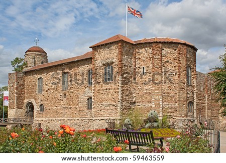 11th century Norman castle in Colchester in springtime and UK flag.
