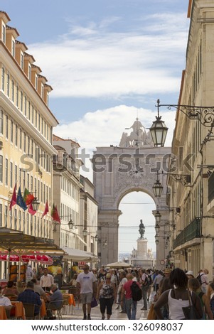 LISBON - SEPTEMBER 21: people walking along Lisbon\'s boulevard Rua Augusta on a sunny afternoon on September 21st, 2015.