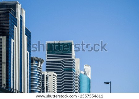 Similar – Image, Stock Photo The impressive skyline of the Brandenburg Gate in the evening light. With white blue clouds.