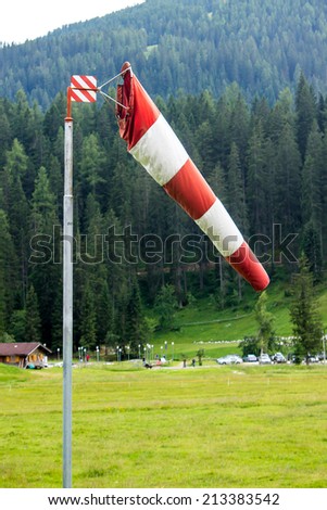 typical windsock to measure the direction of the wind in the mountains