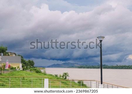 Similar – Image, Stock Photo Cloud drama and lakeside with reflection in moor lake