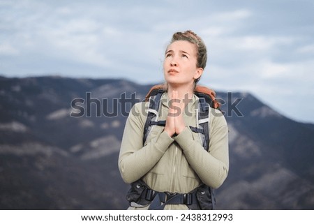 Similar – Image, Stock Photo Pleased tourist with backpack taking selfie on smartphone sitting on bridge above mountain river