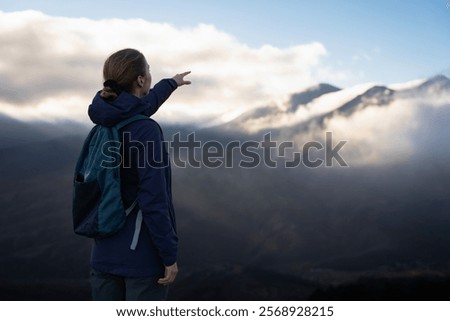 Similar – Image, Stock Photo Unrecognizable traveler in mountains in winter