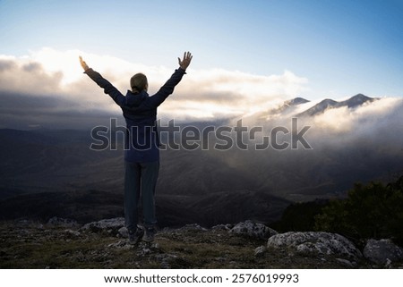 Similar – Image, Stock Photo Unrecognizable traveler in mountains in winter