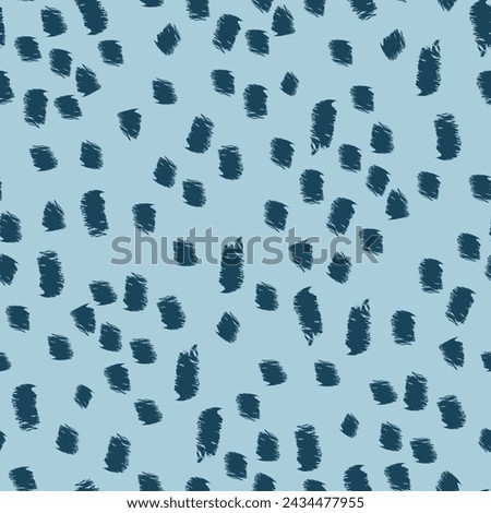 Abstract animal skin seamless repeat pattern with navy shapes, spots, brush marks on soft warm blue background
