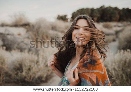 Similar – Image, Stock Photo Beautiful woman on desert nature during sunset