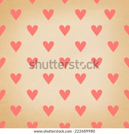 Seamless watercolor heart pattern on paper texture. Valentine\'s day background