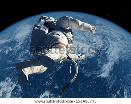 The astronaut  on the background of the planet.\