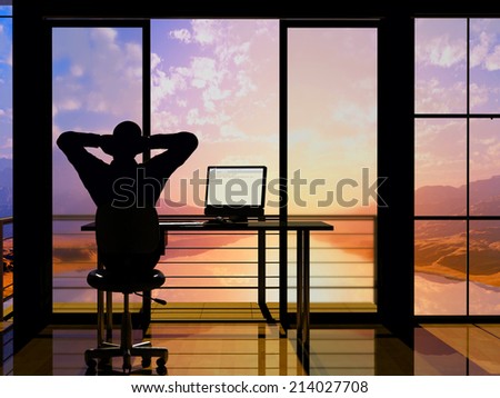 Silhouette of a man in a chair in office.