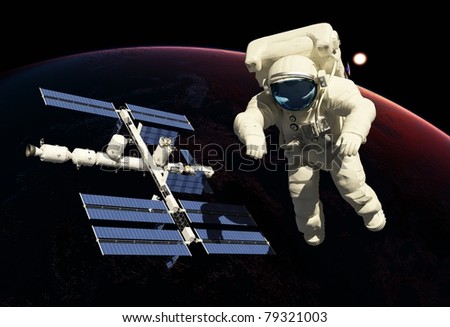 The astronaut on a background of a planet