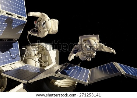Astronauts in space around the solar battarei.