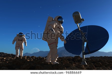 The astronauts  on the background of the planet.