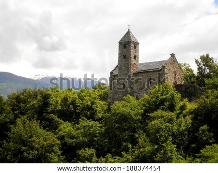 Stunning view of a swiss church on the hill.
