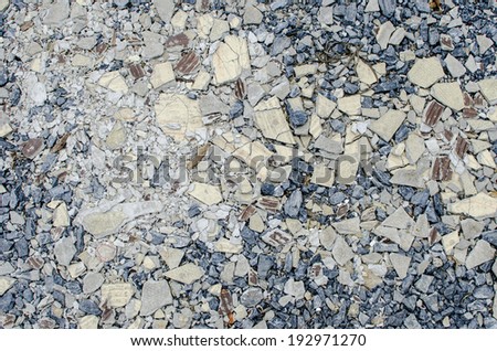 Gravel mix with crack tile texture background