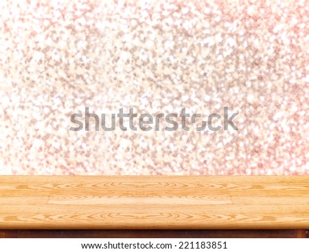 Wood Table with bokeh pink sparkling background,Empty room for display your product