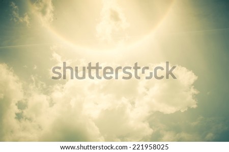 Vintage filter : Sun Halo with cloud and blue sky