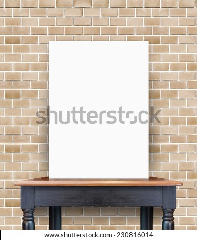 Blank white poster banner standing on vintage wooden table at orange bricks wall, Mock up template for present business concept.