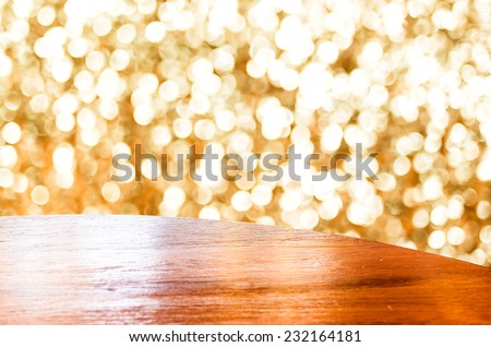 Empty round table top at abstract sparkle blurred background with bokeh light,Template mock up for display of your product.