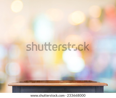 Empty Black vintage table top at store blurred background with bokeh light,Template mock up for display of your product.