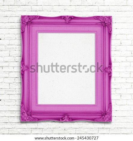 Blank pink Vintage photo frame on white brick wall, Template for adding photo