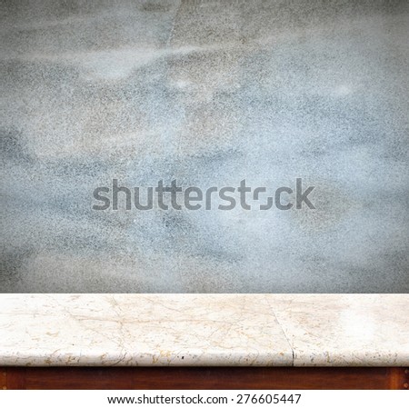 Empty marble table and blue concrete wall in background,product display business template