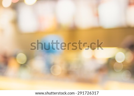 Blur background, counter at coffee shop with bokeh light,vintage filter.