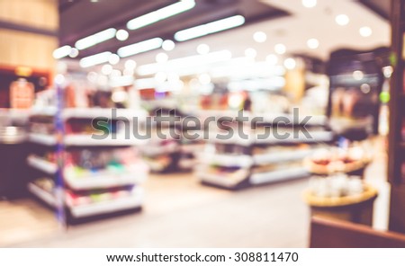 Blurred background : Vintage filter ,Product shelf at store blur background with bokeh.