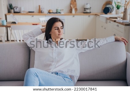 Similar – Image, Stock Photo Young spanish woman with curly hair showing victory sign with a cute smiling face while working on his laptop. Close up portrait. Freelancer happy to work by her own