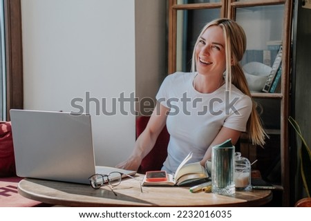 Similar – Image, Stock Photo Young woman with blond Labrador sits on beach dune