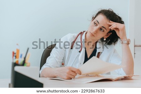 Similar – Image, Stock Photo hard working female doctor, heath care worker with face shield and mask in black and white