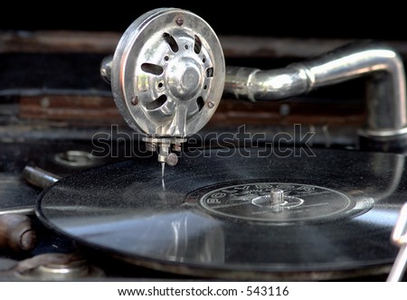 Vintage gramophone with old vinyl disk