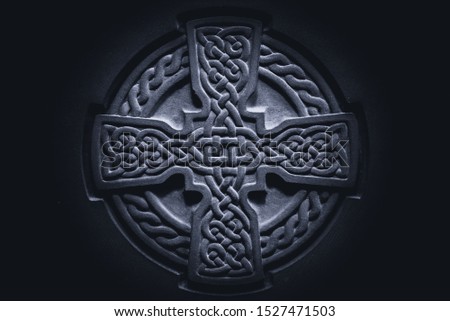 Wonderful embossed Celtic stone cross, full of details and textures in its elaborate carvings. Photo stock © 