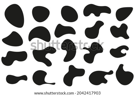 Organic black blob with irregular shape. Abstract blotches, ink smudges and pebble silhouettes, simple liquid amorphous splodge elements make up a creative minimal bubble rock vector set. 