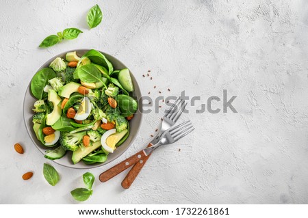 Similar – Image, Stock Photo Spinach salad with eggs avocados tomatoes and mozzarella cheese