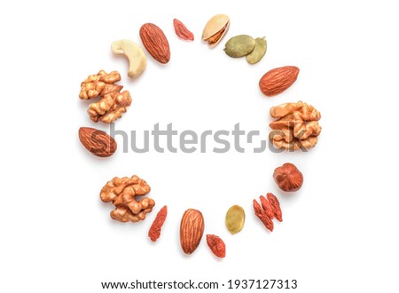Nuts assorty in shape of circle isolated on white background. Top view. Copy space. Photo stock © 