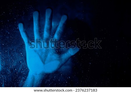 Similar – Image, Stock Photo Anonymous person touching glass of window