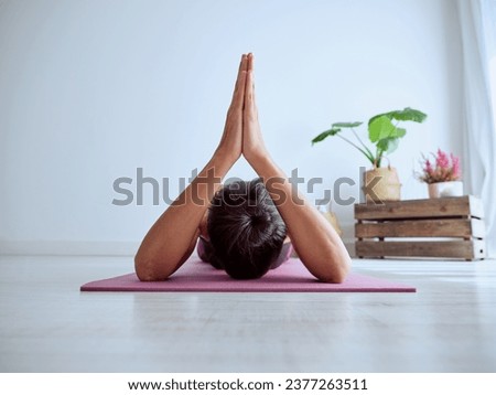 Similar – Image, Stock Photo Anonymous sportswoman practicing yoga on street