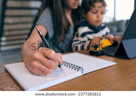 Similar – Image, Stock Photo Anonymous kid taking care of tomato plants in garden