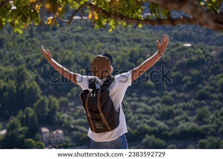 Similar – Anonymer Mann genießt Berglandschaft und See