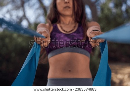 Similar – Image, Stock Photo Anonymous woman stretching body in seated forward bend position