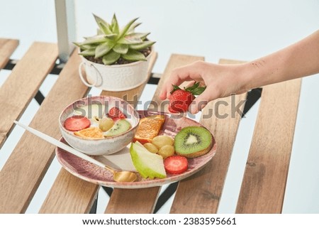 Similar – Image, Stock Photo Crop person taking grape juice in glass