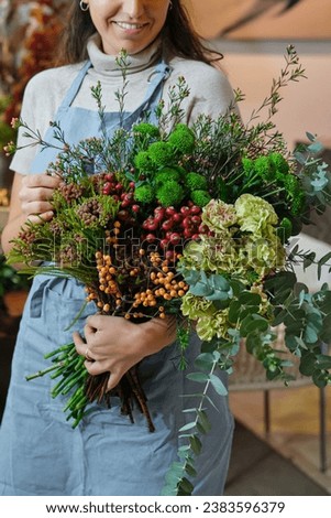 Similar – Image, Stock Photo Unrecognizable female professional florist making bouquets.