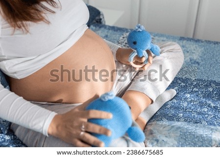 Similar – Image, Stock Photo Anonymous delicate mother sitting on floor with newborn at home