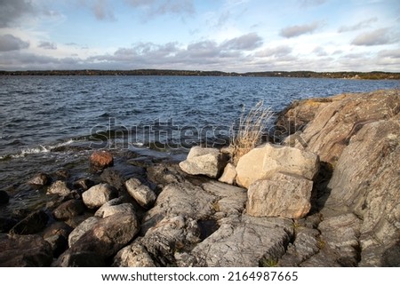 Similar – Foto Bild Felsige Küste unter blauem Himmel