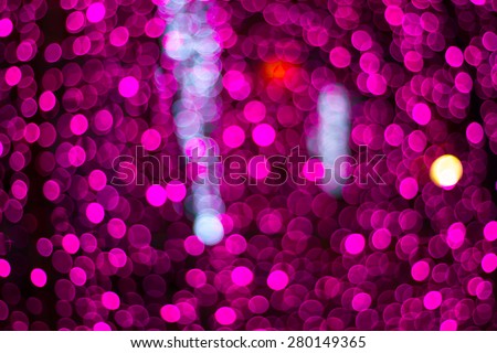 defocused pink and purple lights background photo