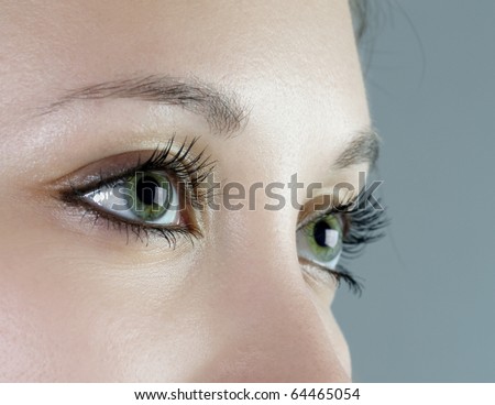Close up shot of a beautiful green eyes (shallow DoF)