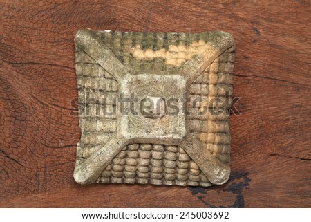 Old and vintage surface texture of sand stone pavilion roof architectural sculpture model with moss stain represent the texture and surface background.