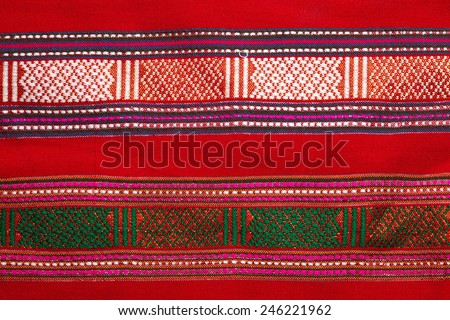 Traditional northern and northeastern Thai style handmade fabric weave  by interweave process represent the textile surface texture background.