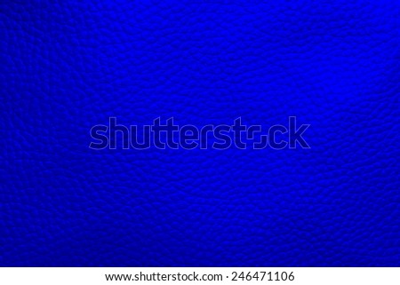 Close up photo of blue  color filtered leather surface texture style represent the surface background.