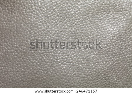 Close up photo of grey color filtered leather surface texture style represent the surface background.